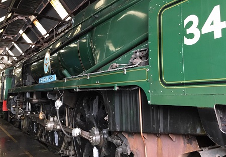 34053