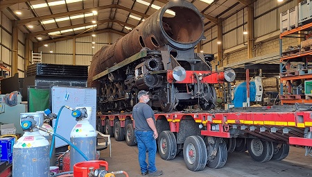 34053